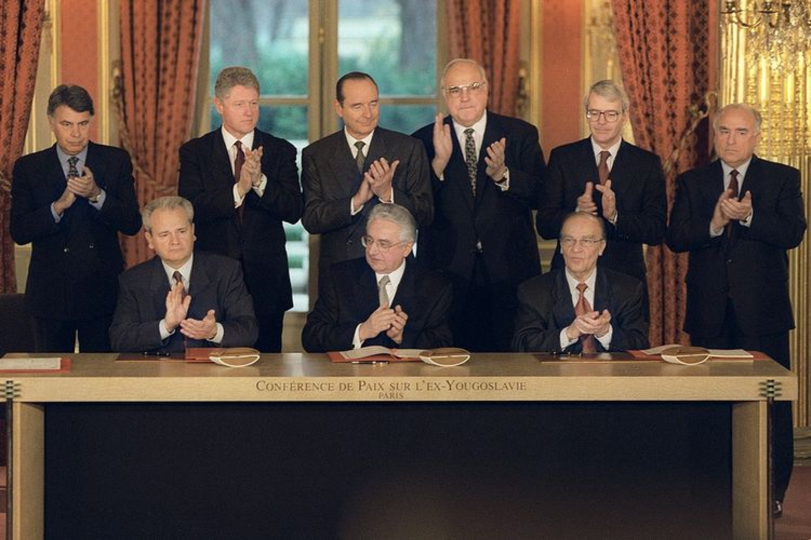 Dejton, realisti i neokonzervativci