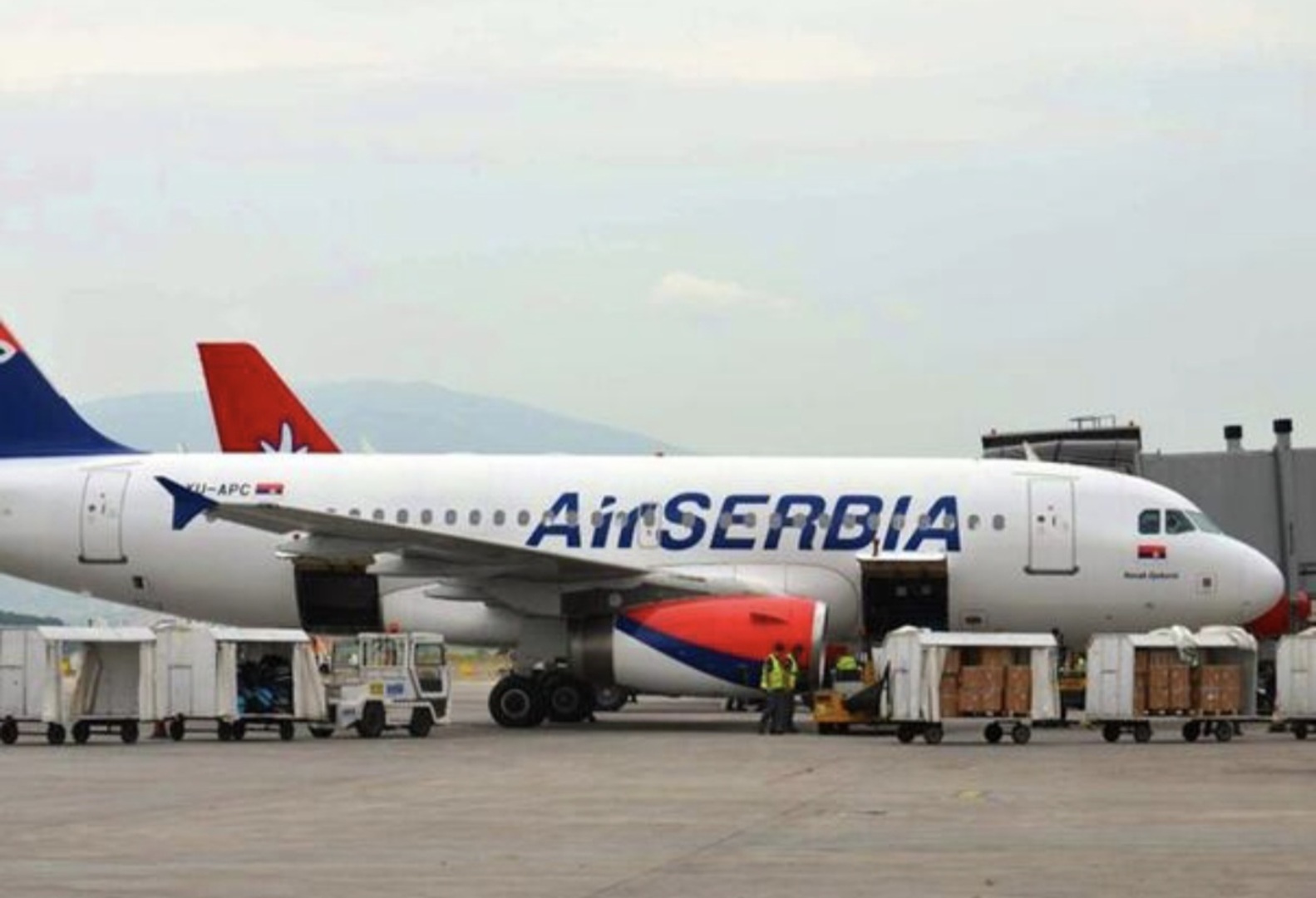 U avionu za Srbiju evakuisani i putnici iz BiH - slika 1